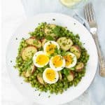 This is a delicious potato and egg salad with peas super easy to throw together, you need just a few basic and inexpensive ingredients like potatoes, eggs, frozen peas and fresh herbs.  And not only is it perfect for a picnic, but it makes a nice and healthy lunch all year round.