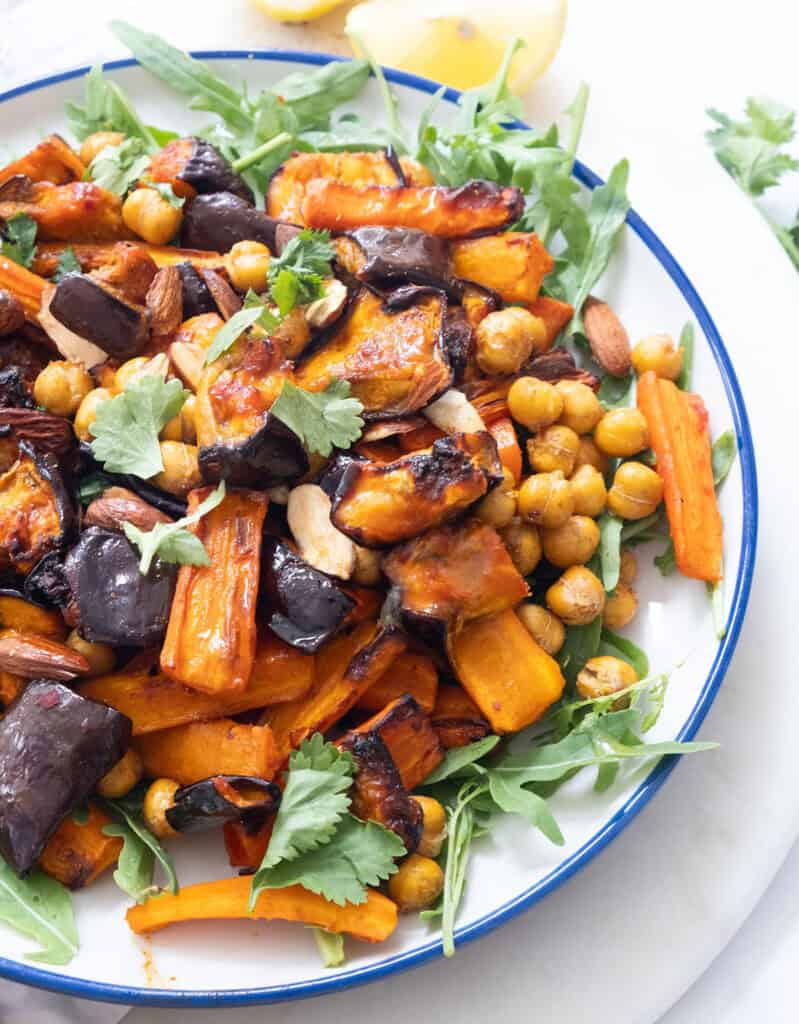 Harissa eggplant carrot salad on a plate.