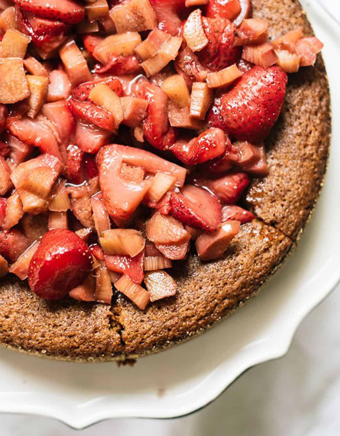 A round cake with plenty of strawberries on top - Cookie & Katie