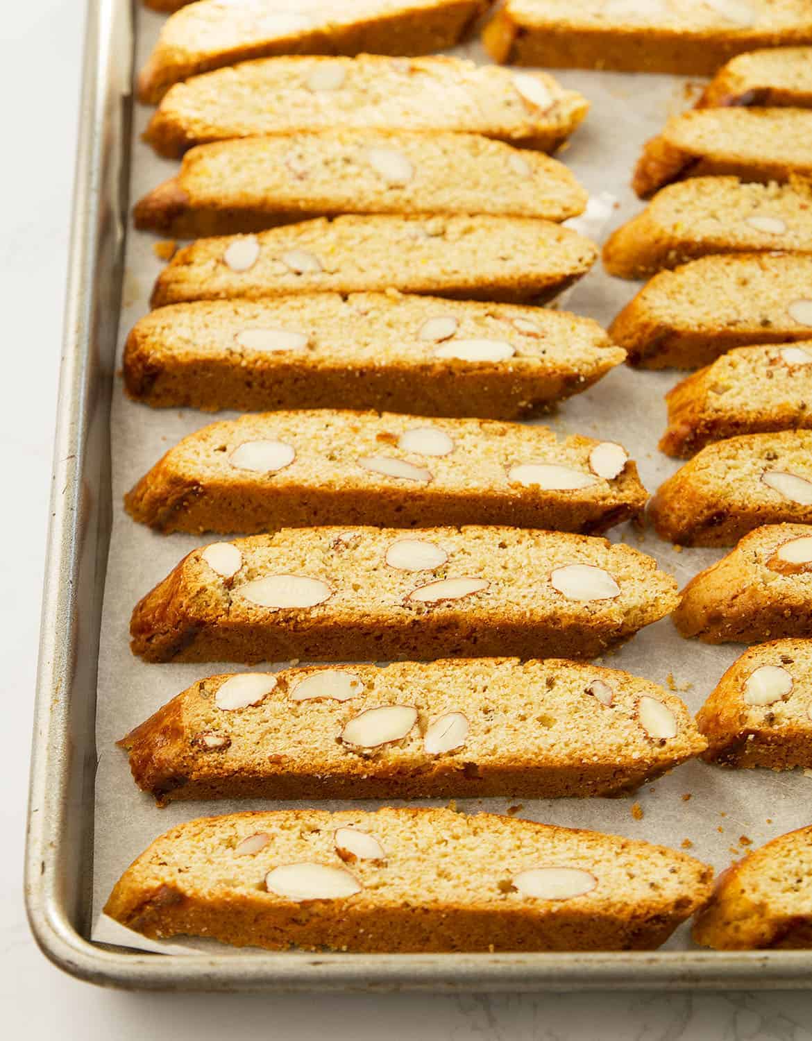 Almond biscotti on a baking tray.