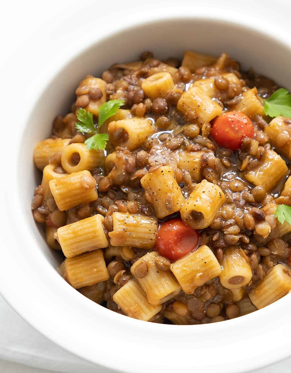 Vegan ditalini pasta and lentils in a white bowl - The Clever Meal