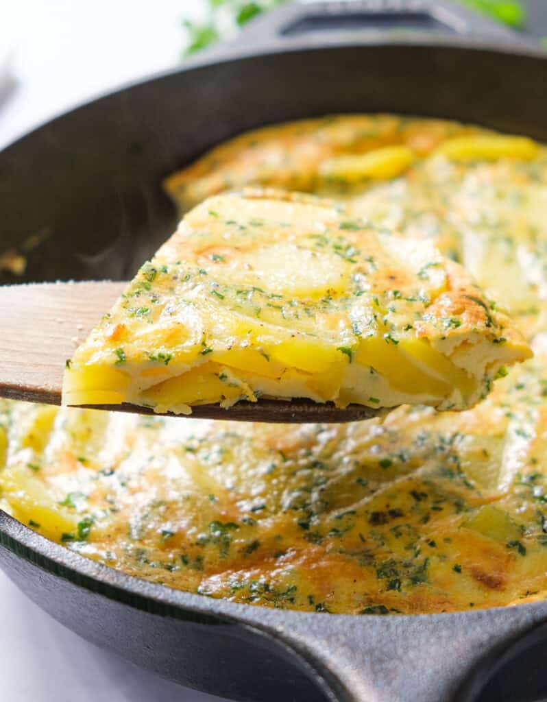 Close-up of a slice of potato frittata.
