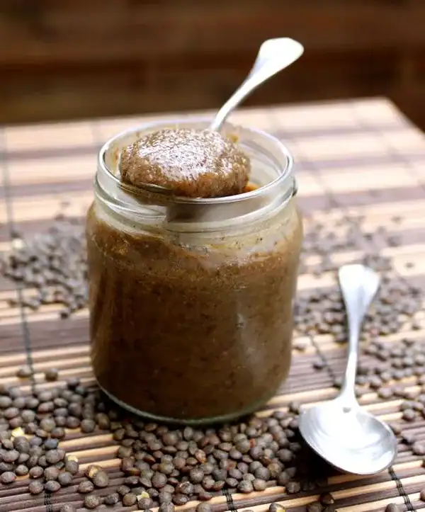 Green lentil jam in a jar.