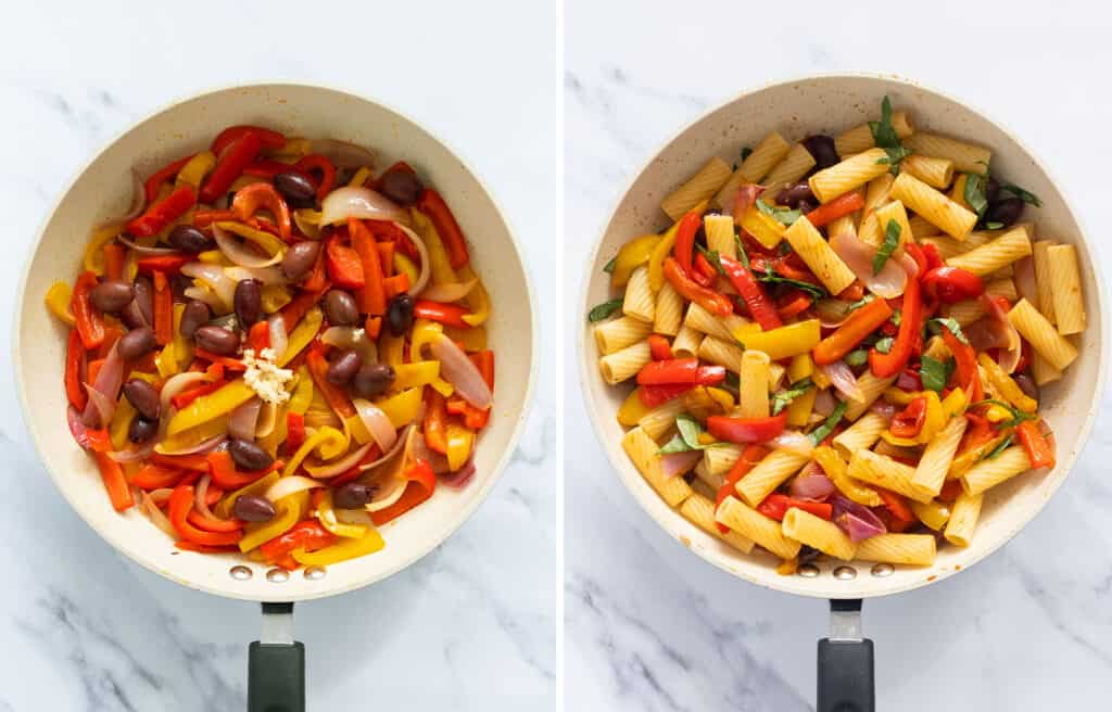 Top view of a pan full of peppers, olives, and rigatoni pasta over a white background.