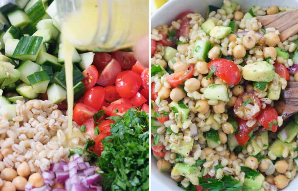 A glass jar pouring lemon dressing over barley and chopped vegetables.