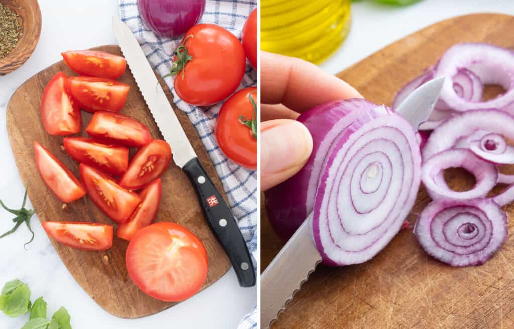 A knife cutting tomatoes and a red onion into slices.