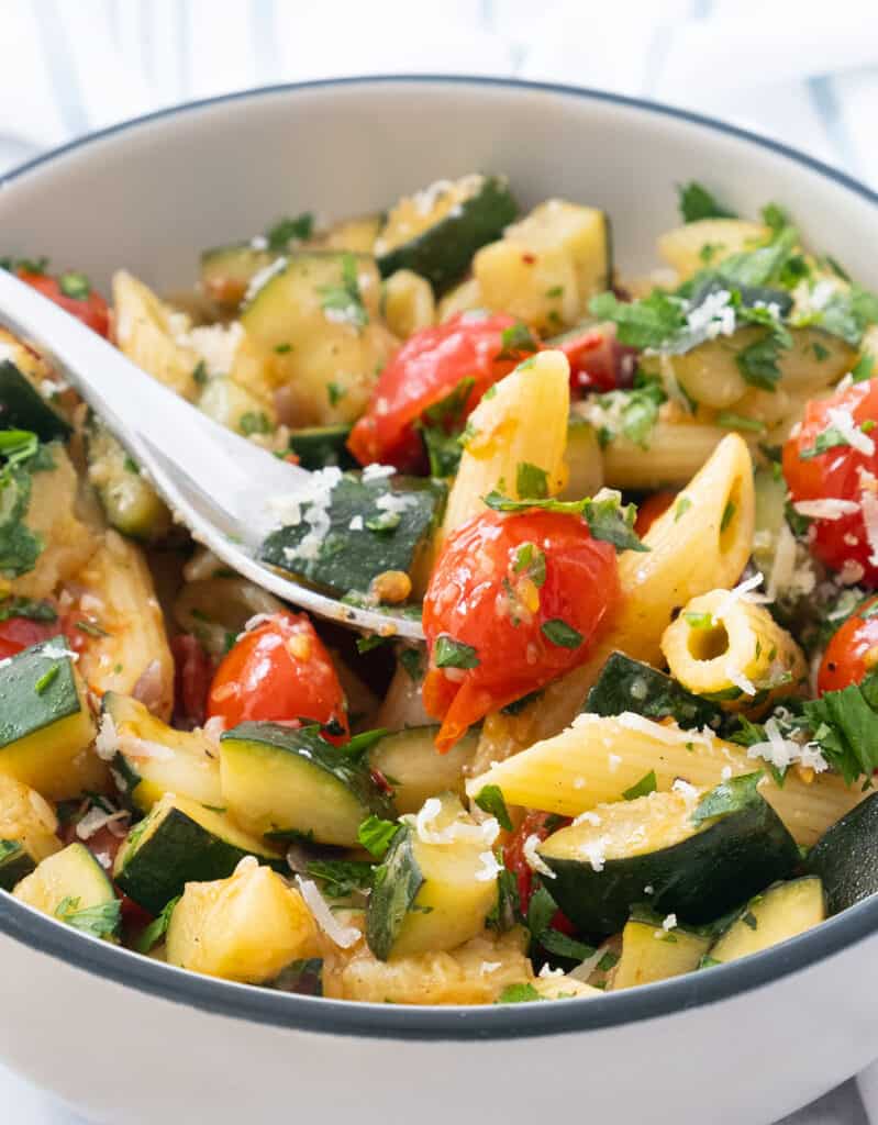 Close-up of a bowl full of this vegetarian pasta dish.