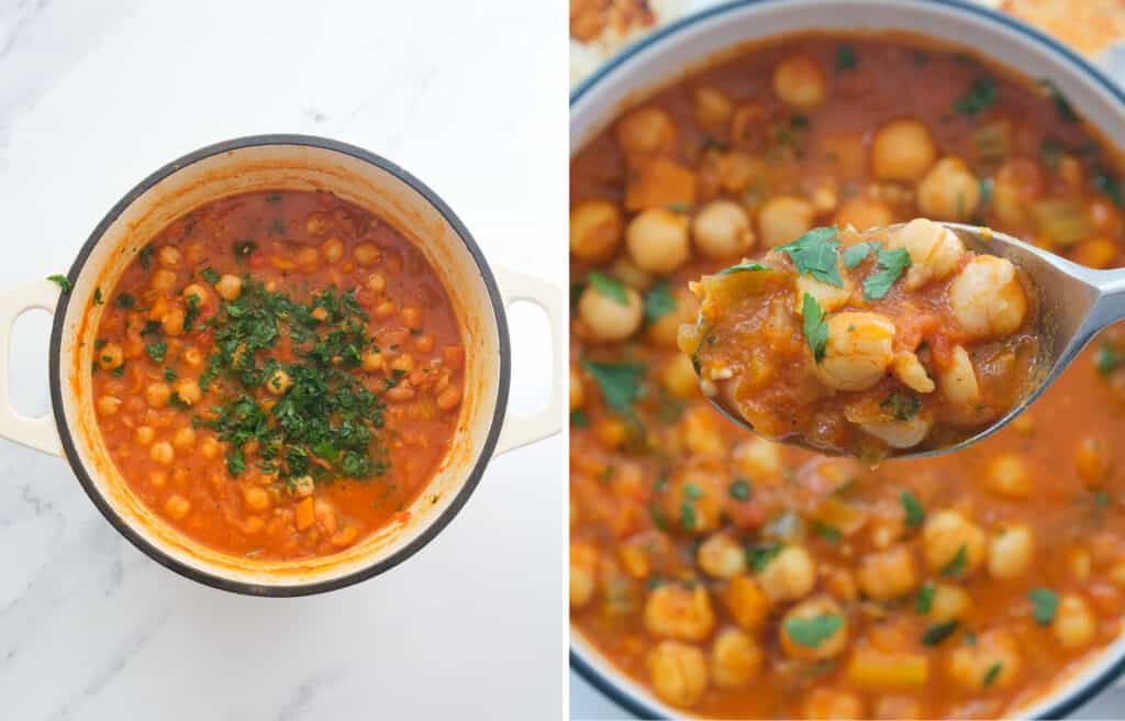 Top view of white Dutch oven and a spoon lifting some rich, thick chickpea stew.