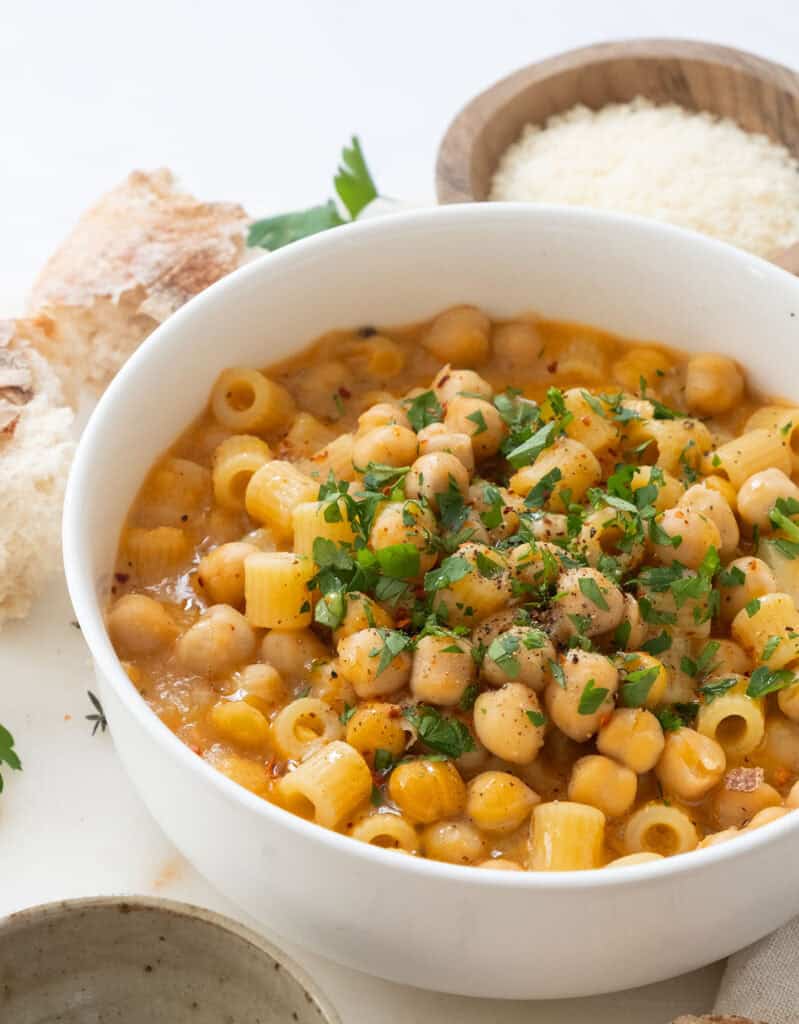 Close-up of a white bowl full of chickpea pasta.
