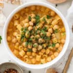 Top view of a white bowl full of chickpea pasta.