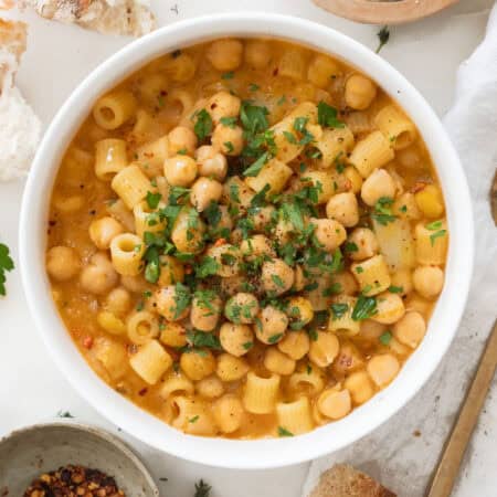 Top view of a white bowl full of chickpea pasta.