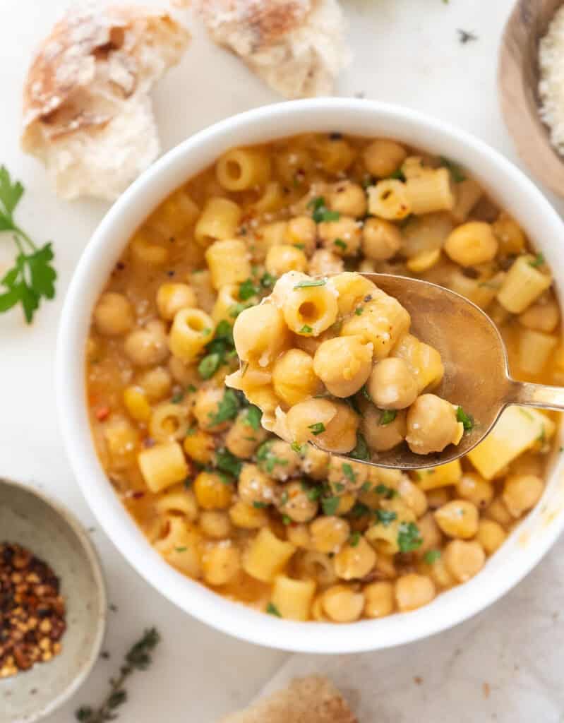 Close-up of a spoonful of chickpea paste.