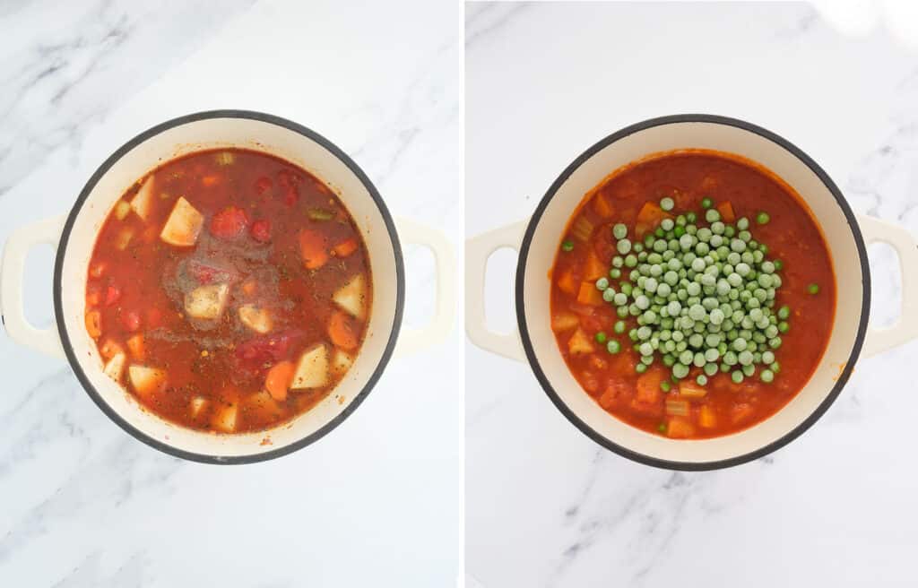 Top view of a white Dutch oven full of tomato stew and frozen peas.