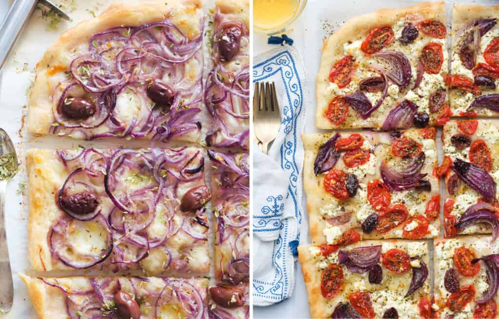 Top view of a large pizza with red onions and a pizza with roasted onions, tomatoes, olives and feta.