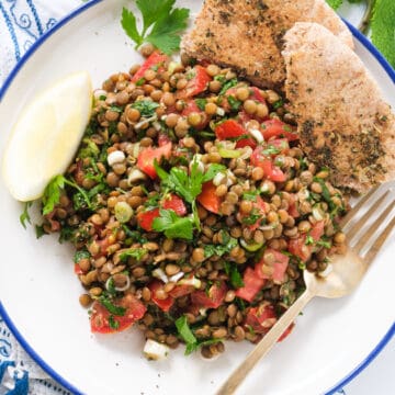 Top view of a plate full of lentil tabbouleh, a delicious vegan salad recipe.