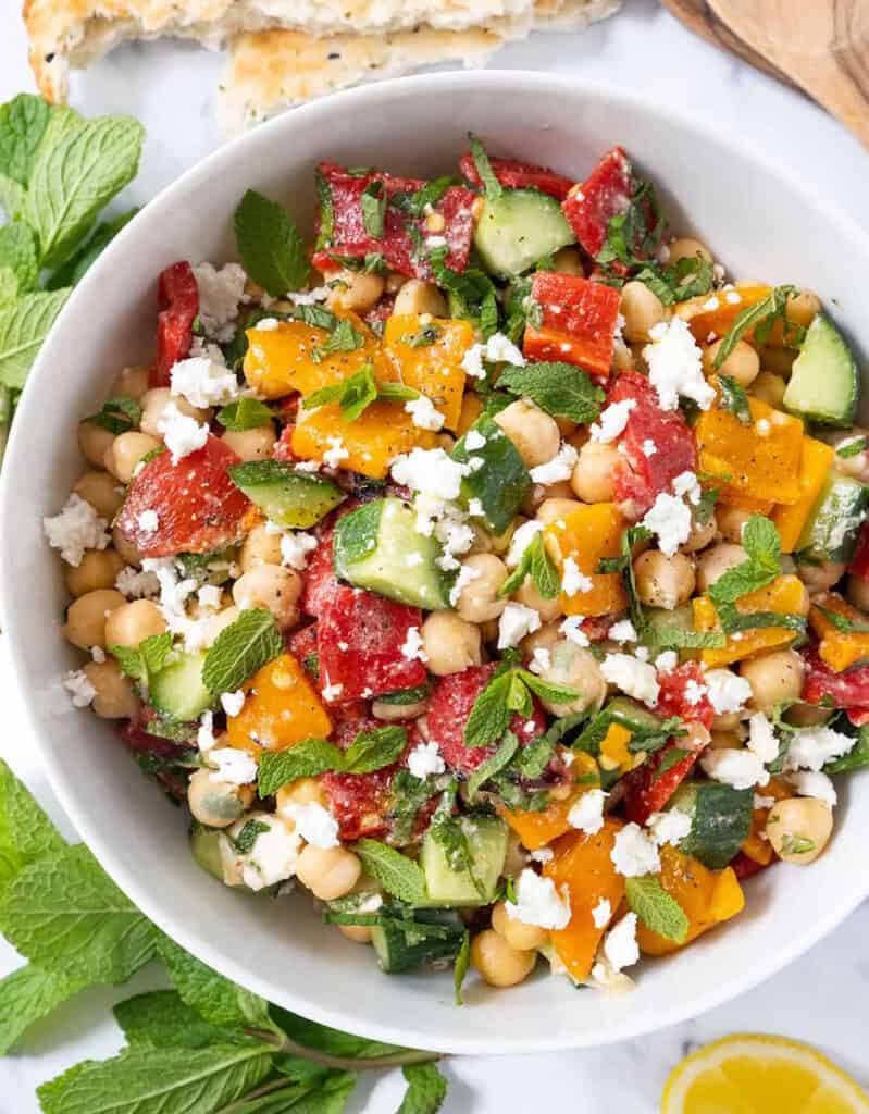 Top view of a salad made with mint, chickpeas, peppers and feta, one of my fav mint recipes!
