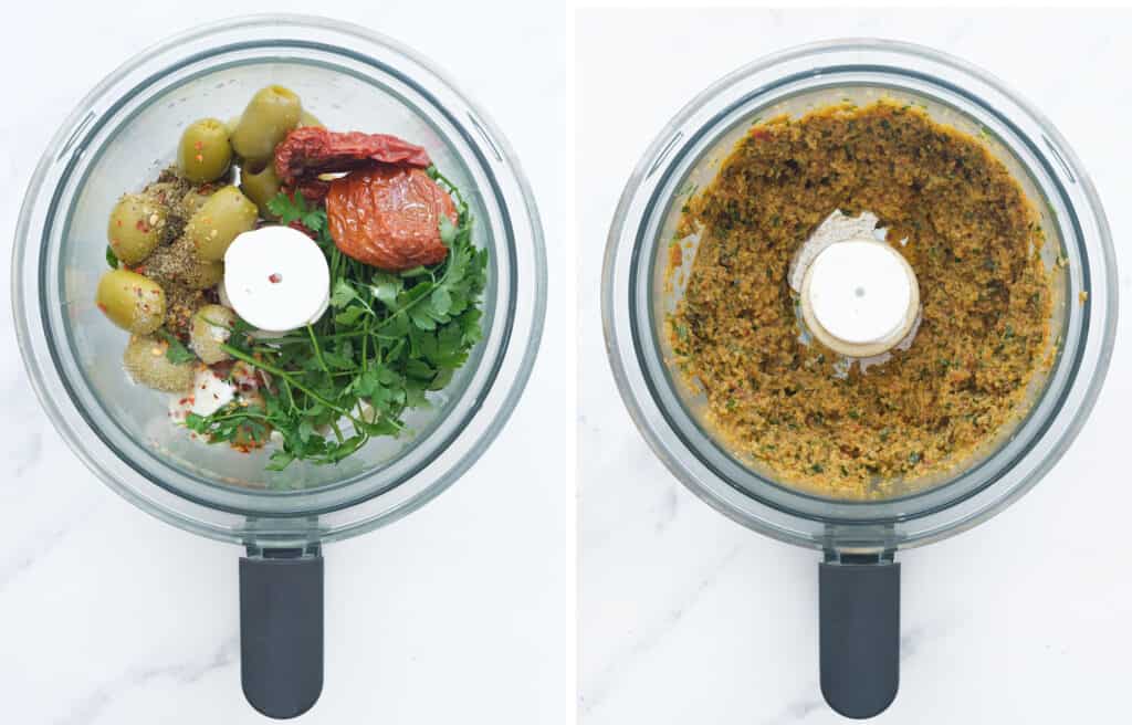 Top view of a food processor full of the ingredients to make this olive tapenade.