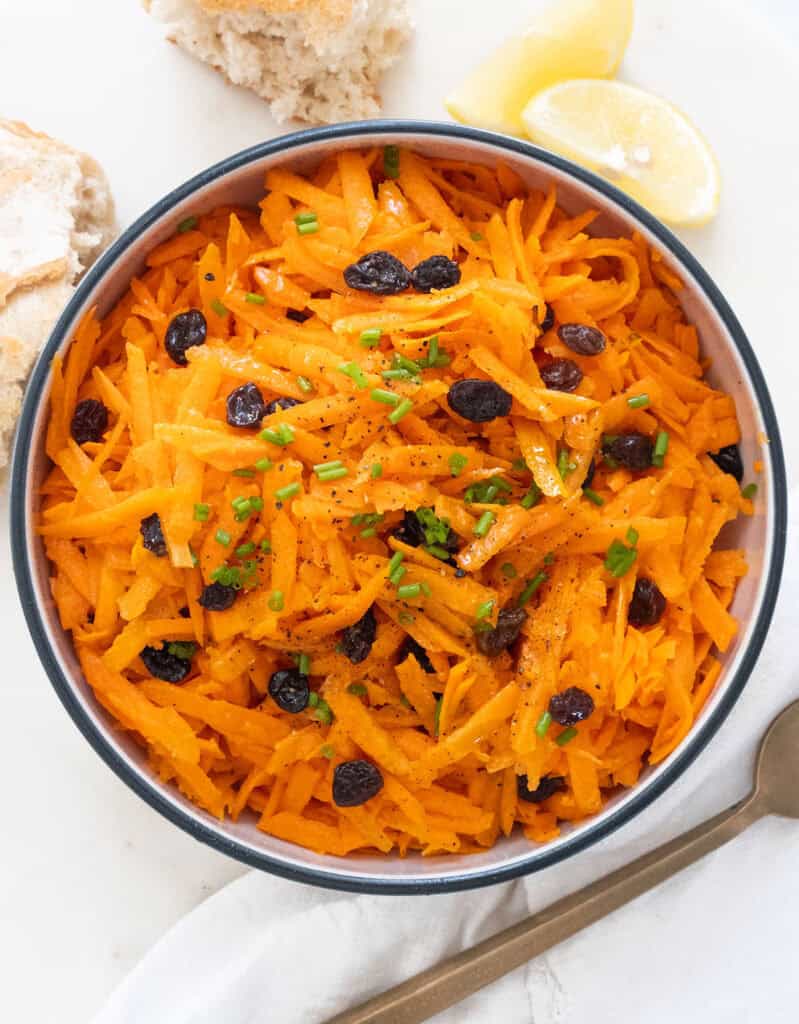 Carrot raisin salad in a bowl.