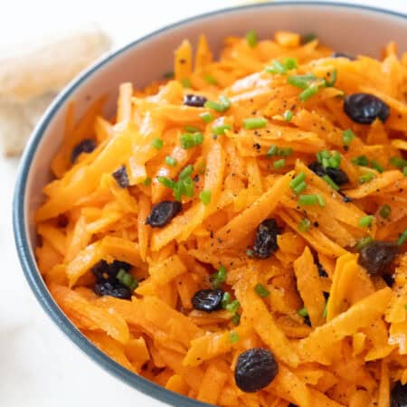 Carrot raisin salad in a bowl.