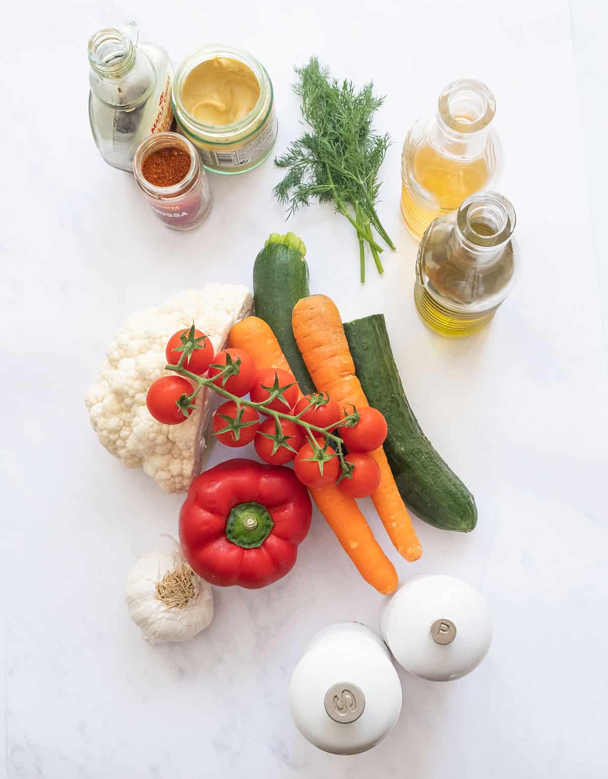 Top view of the ingredients to make marinated vegetable salad.