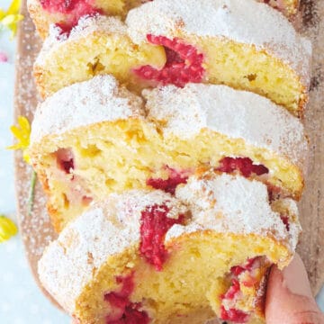 Close-up of a delicious raspberry ricotta cake cut into slices.