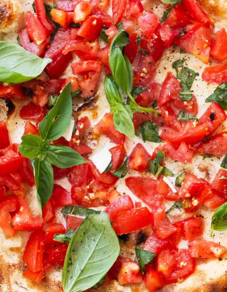 Close-up of the bruschetta pizza topping.