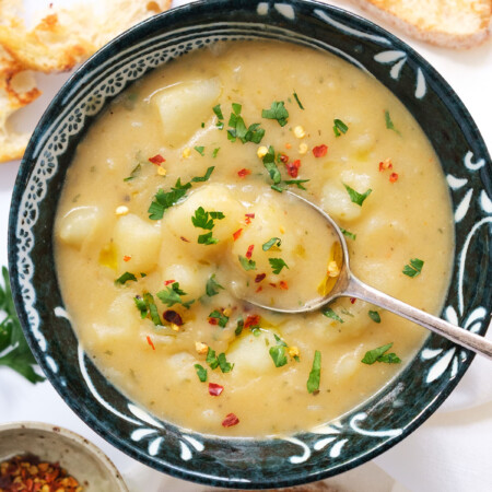 Top view of a bowl full of vegan potato soup.
