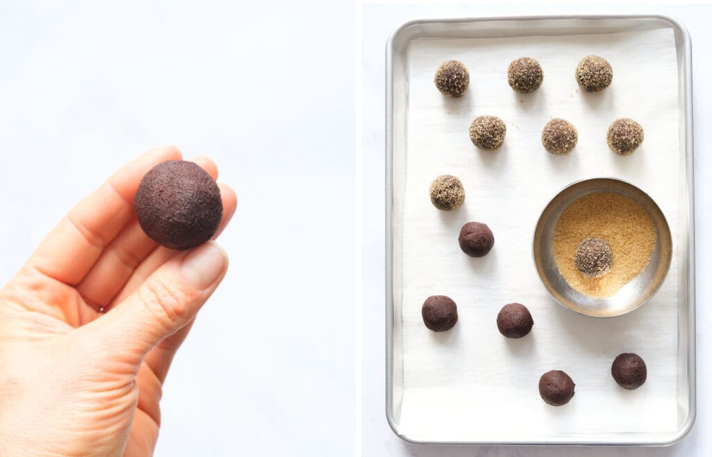 Top view of the cocoa cookie balls on a baking sheet before baking.