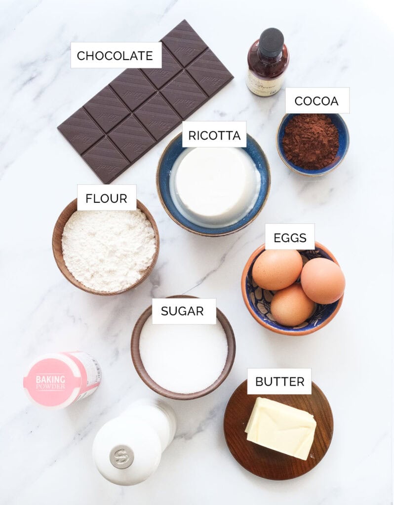 Top view of the ingredients to make chocolare ricotta cake.