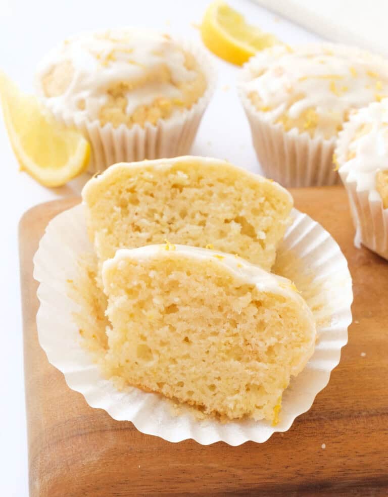 Close-up of a lemon ricotta muffin split into halves.