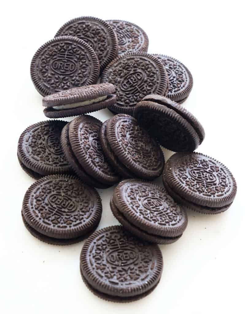 Plenty of oreo cookies over a total white background.