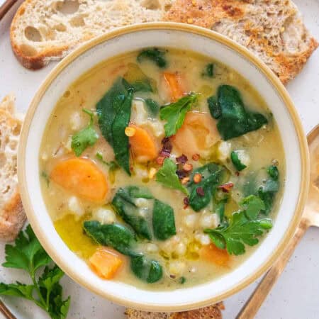 Top view of one of the low-calorie soup recipes made with barley and veggies.