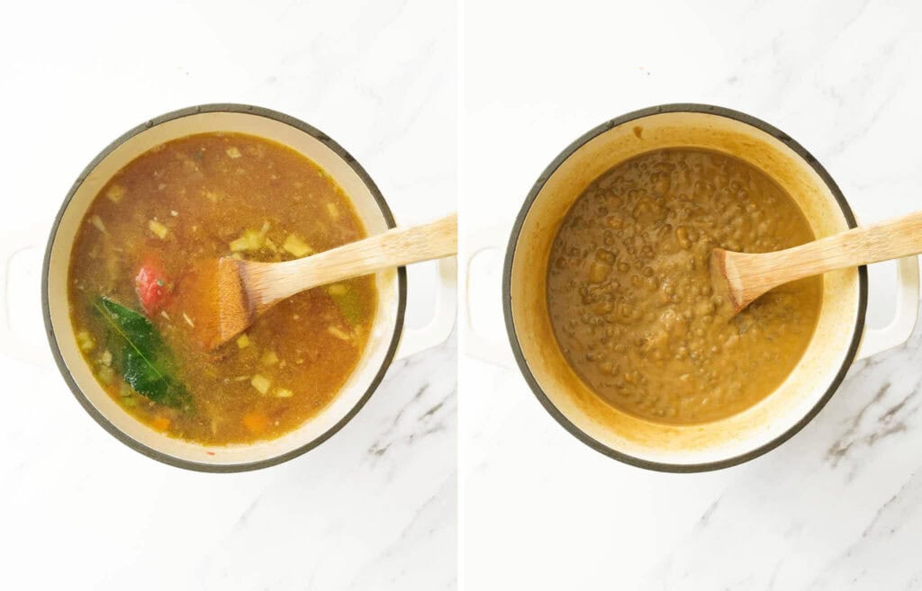 Top view of a white pot full of green lentil soup and a wooden spoon over a white background.