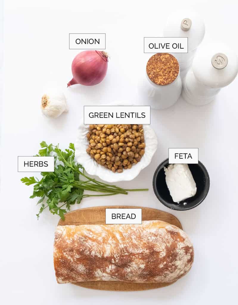 Top view of the ingredients to make lentil bruschetta.