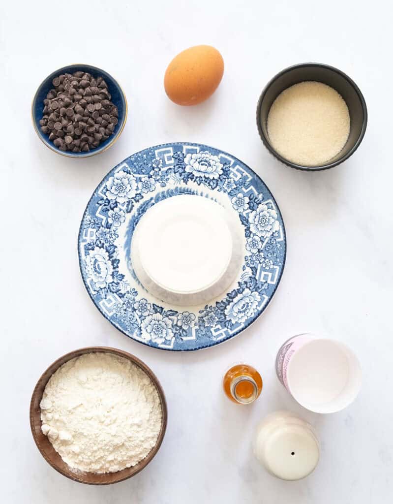 The ingredients to make chocolate chip ricotta cookies.