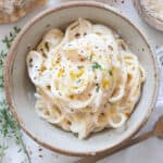 Creamy goat cheese pasta in a bowl.