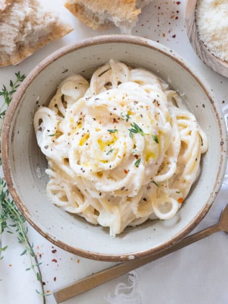 Creamy goat cheese pasta in a bowl.